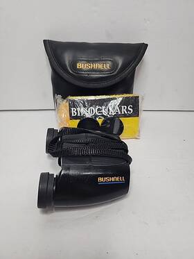13-1028 Bushnell 10x24 Binoculars Model With Case Cleaner And Covers. Works Great