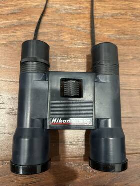 540484 Nikon 10x25 Binoculars Black Neck Strap