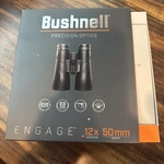 Bushnell Engage Binoculars, 12X50MM, Matte Black. Fixed Price $400.00.