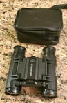 Meikai Folding Binoculars Marked "the Plain Dealer" With Carrying Case. Fixed Price $20.00.