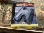 Bushnell Perma Focus Binoculars 10X42 With Case, Cloth, And Neck Strap. Fixed Price $50.00.