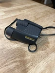 Bushnell Binoculars 10X24 Compact Black Model 13-1024 262FT/1000YDS. Fixed Price $18.99.