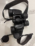 Nikon Action 7X35 Binoculars 9.3 Degree Neckstrap. Fixed Price $49.00.