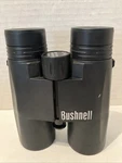 Bushnell Binoculars 12X42 21-1224 225FT Fov 1000 Yds. Fixed Price $35.00.