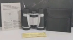 Binoculars W/ Compass Neck Strap & Carry Bag Lens Cleaner Cloth 1/4". Fixed Price $17.97.