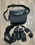 Nikon Action Ax 7-15X35 Zoom Binoculars W/ Case. Fixed Price $69.99.