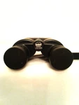 Binoculars, Bushnell Powerview 7-15 X 25MM With Neck Strap & Case. Fixed Price $35.00.