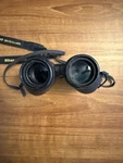 Nikon Travelite 10X25 Compact Binoculars With Carrying Case And Strap. Fixed Price $25.99.