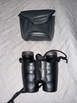 Nikon Travelite 10X25 Compact Binoculars With Soft Case. Fixed Price $30.00.
