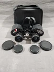 Model 3002 Traq Binoculars With Carrying Case 7X35. Fixed Price $11.95.