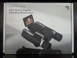 Sharper Image 12X Zoom Digital Camera Binoculars (new, Open Box). Fixed Price $125.00.