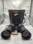 Vintage Bushnell Featherlight 7 50MM Binoculars Triple Tested Silver Medallion. Fixed Price $58.00.
