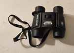 Meade Compact Binoculars 12X25 337 FT/1000 Yds Waterproof. Fixed Price $18.99.