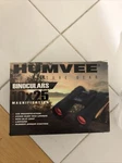 Humvee B-10X25B Black Compact Binocular Ruby Red Lenses. Fixed Price $12.00.
