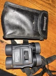 Bushnell Binoculars 10X25 Waterproof With Case Fov 342FT 1000YDS. Fixed Price $23.00.