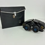Tasco Executive Electric Zoom Binoculars 7X-15X35 Model 108 With Case. Fixed Price $12.87.
