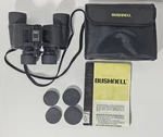 Bushnell 7X35 Insta Focus Binoculars 420 Ft. Range, 1000M Altitude Case. Fixed Price $39.99.