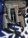 Bushnell Insta-focus 7X35 Coated Optics Porro Prism Binoculars Black Case. Fixed Price $24.99.