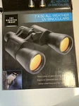 Sharper Image 7X50 Binoculars W/ruby Colored Uv Optics. Fixed Price $9.99.
