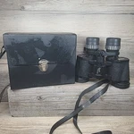 Sears Binoculars Model No. 583 25180 Discoverer Zoom 227FT. / 1,000 Yds. At 15X. Fixed Price $19.97.