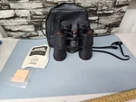 Simmons Binoculars Model 1102 Case 12X50 275FT At 1000 Yards. Fixed Price $30.00.