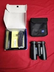 Zeiss Conquest 8X30 T* Binoculars With Carrying Case And Strap. Fixed Price $600.00.
