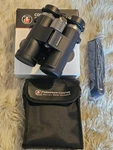 Thompson Center Compact Roof Prism Binoculars 10X42 # 1125576 - New. Fixed Price $54.99.
