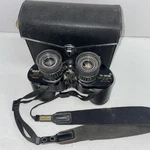 Vintage Tasco Binoculars Zoom Fully Coated Optics Model No. 100 7X-15X35 330. Fixed Price $40.00.