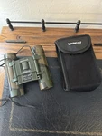 Tasco Binoculars 10X25 W/case 2168CR. Fixed Price $25.00.