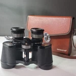 Tasco Zoom Binoculars With Hard Case Reg No. 74101 Fully Coated Optics 1000 Yds. Fixed Price $99.00.