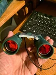Konus Green #2032 Action Binoculars 10X25 With Case And Neck Strap. Fixed Price $24.00.