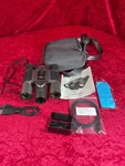 The Sharper Image 10X25 Digital Camera Binoculars Black. Fixed Price $10.19.