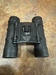 Tasco Compact Roof Prism 10X25 Binoculars. Fixed Price $15.00.