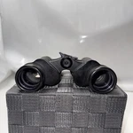 Sears Binoculars Model No. 583 25180 Discoverer Zoom 227FT. / 1,000 Yds. At 15X. Fixed Price $6.00.