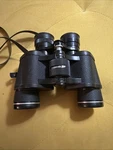 Tasco Zip Focus 4000 7X35MM 1000M Binoculars W Coated Optics And Strap. Fixed Price $10.00.