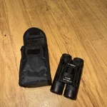 Bushnell 12X 25 240' 1000YDS Sport/hunting Binoculars W/case And Strap. Fixed Price $24.95.