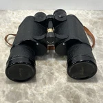 Binolux E-1169956 7X50 Binoculars 372 Ft 1000 Yds Leather Case Strap Caps. Fixed Price $24.99.