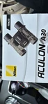 Nikon Aculon A30 10X25 Camo Binoculars With Case & Caps - Hunting Bird Watching. Fixed Price $75.00.