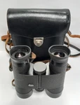 Leitz Wetzlar 7X35B Trinovid 150M/1000M Binoculars Made Germany W/ Case. Fixed Price $209.99.