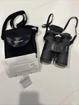 Celestron Outland 10X42 Waterproof Binoculars With Case. Fixed Price $49.87.