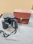 Tasco World Class Binoculars 104CZ. Fixed Price $60.00.
