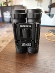 Bushnell Powerview 13-1225C Binocular Black. Fixed Price $15.08.