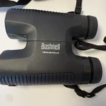Bushnell Perma Focus Binoculars 10X42MM Optics. Fixed Price $34.95.