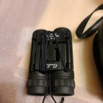 Binoculars Binolux 8 21 392FT 1000 Yards With Leather Case. Fixed Price $15.00.