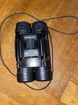 Tasco 10X25 Binoculars Fully Coated Optics 303 Ft / 1000 Yards Model # 168RBDBL. Fixed Price $8.00.