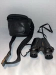 Simmons Binoculars 7-15X25 Compact Model 24157 Fully Coated Optics With Case. Fixed Price $11.88.
