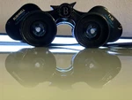 Binoculars Bushnell Sportsview Fully Coated Optics 7X35 520FT 1000YDS. Fixed Price $18.95.