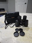 Bushnell 7-15X35 Binoculars 13-7016 With Case And Lens Covers. Fixed Price $32.00.