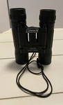 Coleman Binoculars 10X25 96M/1000M Black. Fixed Price $19.50.
