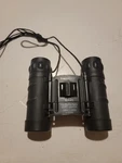 Tasco 8 X 21 Compact Folding Binoculars With Neck Strap Black. Fixed Price $20.30.